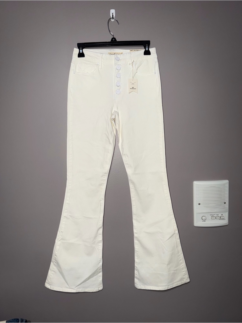 High-Rise White Flare Jeans with Button-Fly